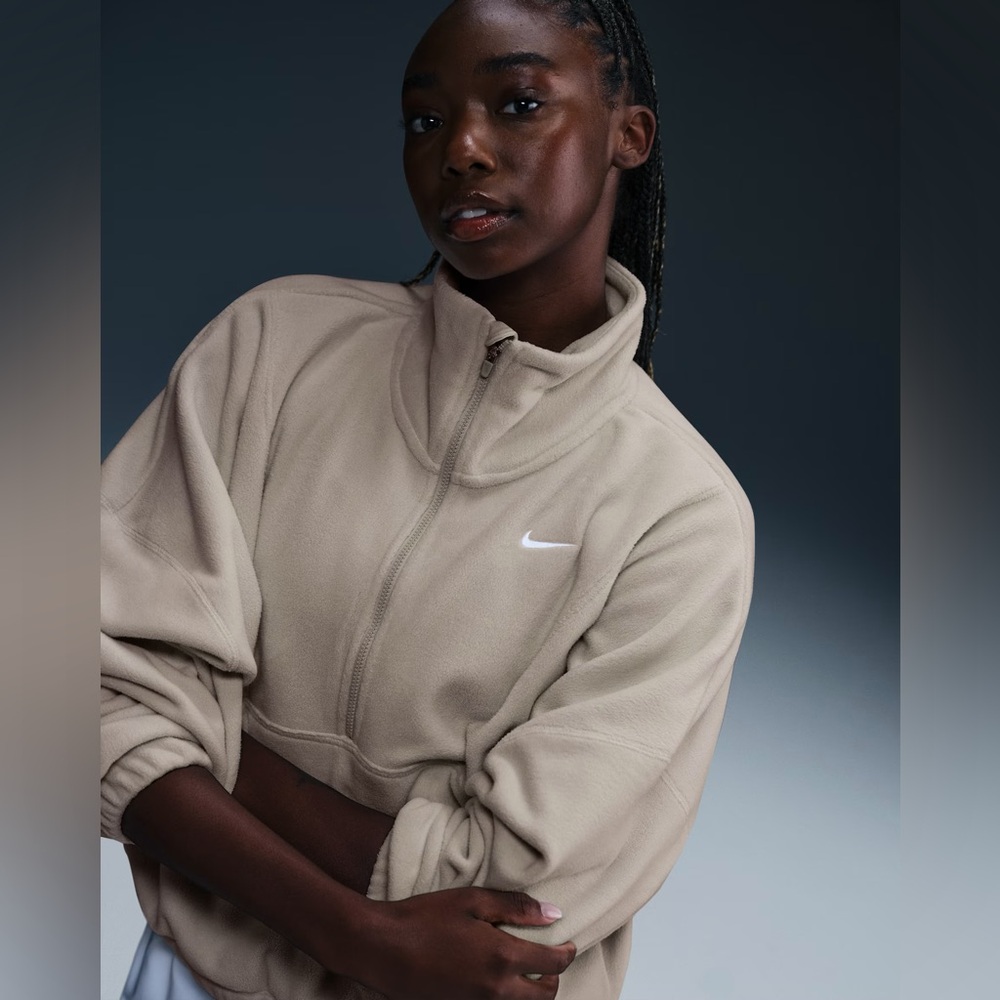 NWT Nike One
Women's Therma-FIT Oversized 1/2-Zip Fleece Top Light Orewood Brown